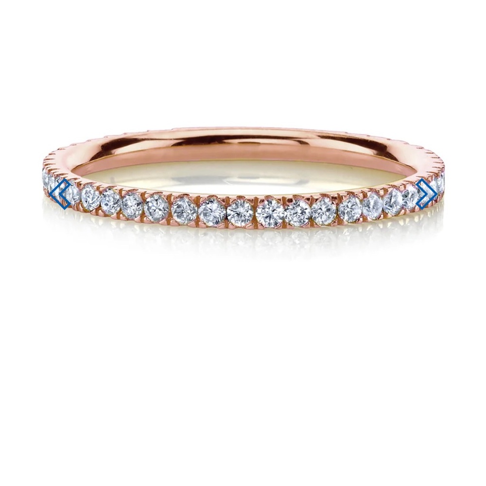 14k Rose gold white diamond eternity band. Diamonds go around the entire band.